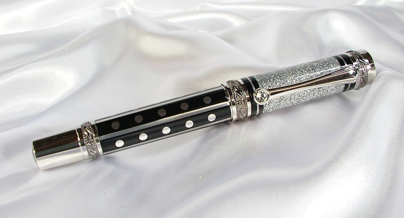 Bash 2024 segmented black and silver pen closed #1 good..jpg  for Bash contest 2024.jpg