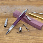 monthly special May 2023 luxor chrome and purpleheart 2000.jpg