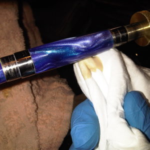 Final polishing of the blue and gold acrylic cigar pen