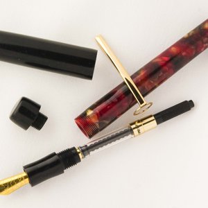 Custom Duo: Ebonite and Red Chunk Resin