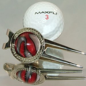 Golfball_divot_repair_tool.jpg