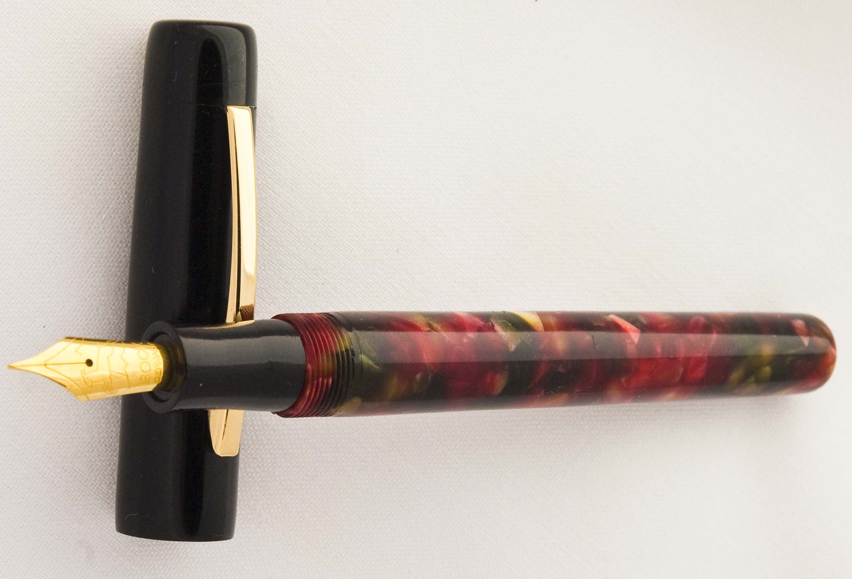 Custom Duo: Ebonite and Red Chunk Resin