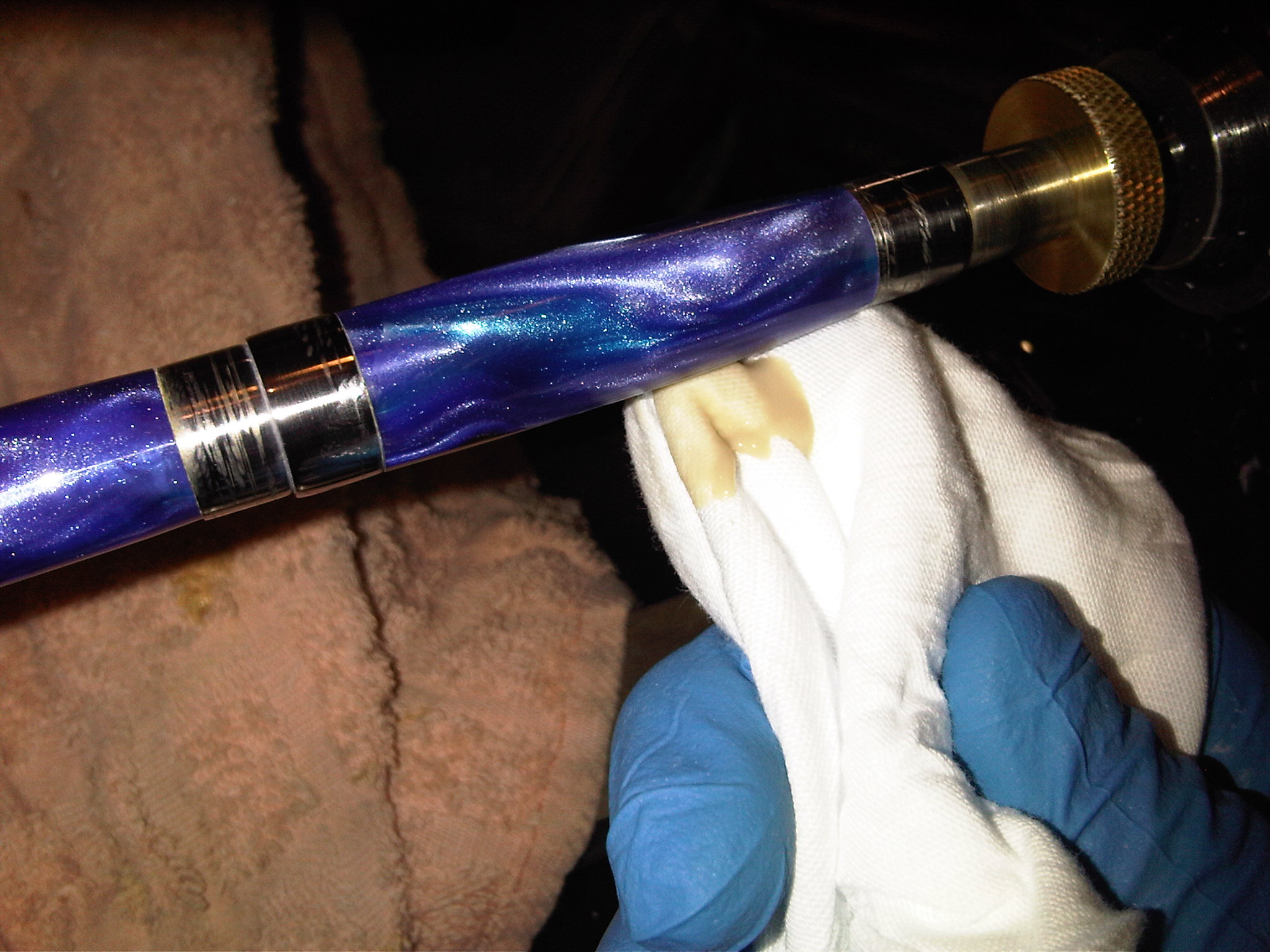 Final polishing of the blue and gold acrylic cigar pen