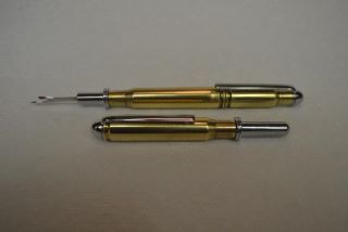 Two seam rippers.